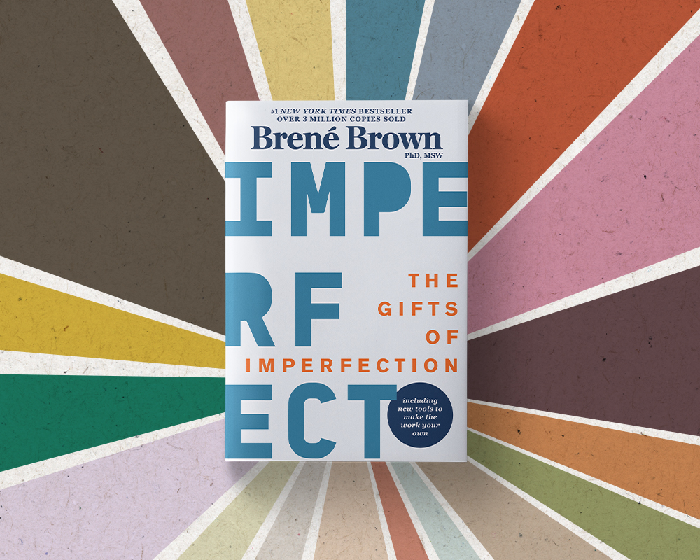 The cover of the book The Gifts of Imperfection by Brene Brown, set against a colorful background. Visit brenebrown.com to order a copy.