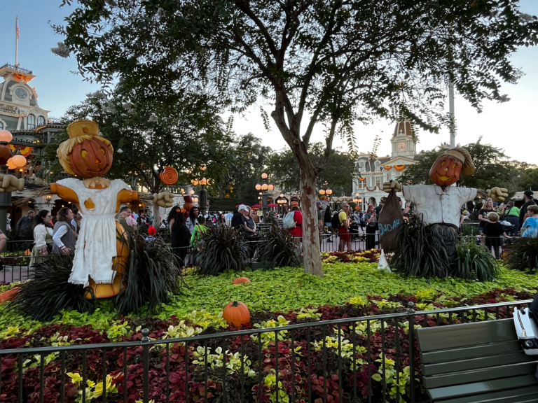 A landscaped area is decorated for Halloween with pumpkin statues