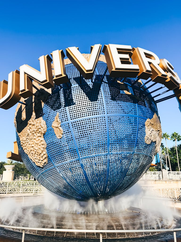 The famous Universal Studios globe fountain with clear blue sky background. Photo by Zeca Souza