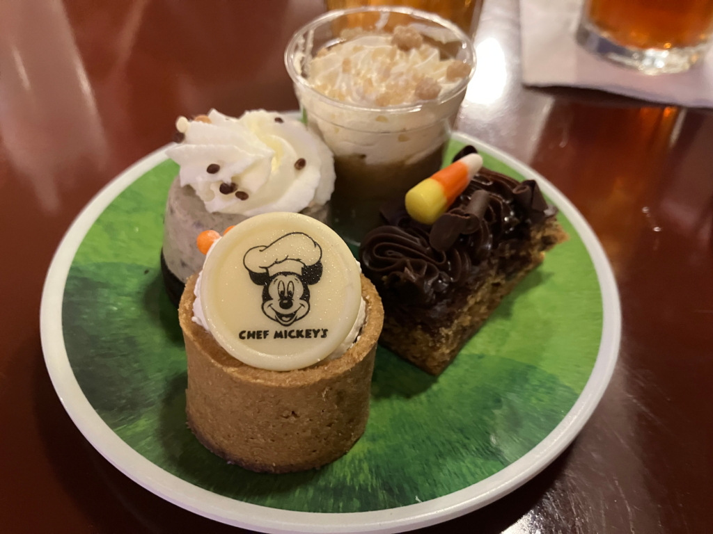 A collection of bite-sized desserts on a plate.